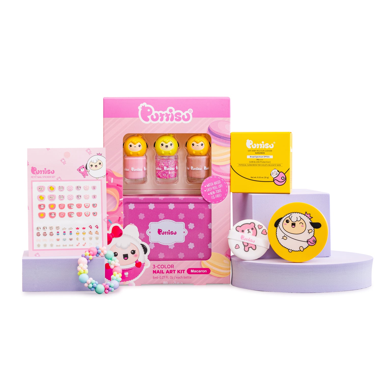 Close-up of a Purriso brand nail art kit, nail stickers, a bracelet, and sunscreen cushions, all arranged on lavender platforms against a white background.