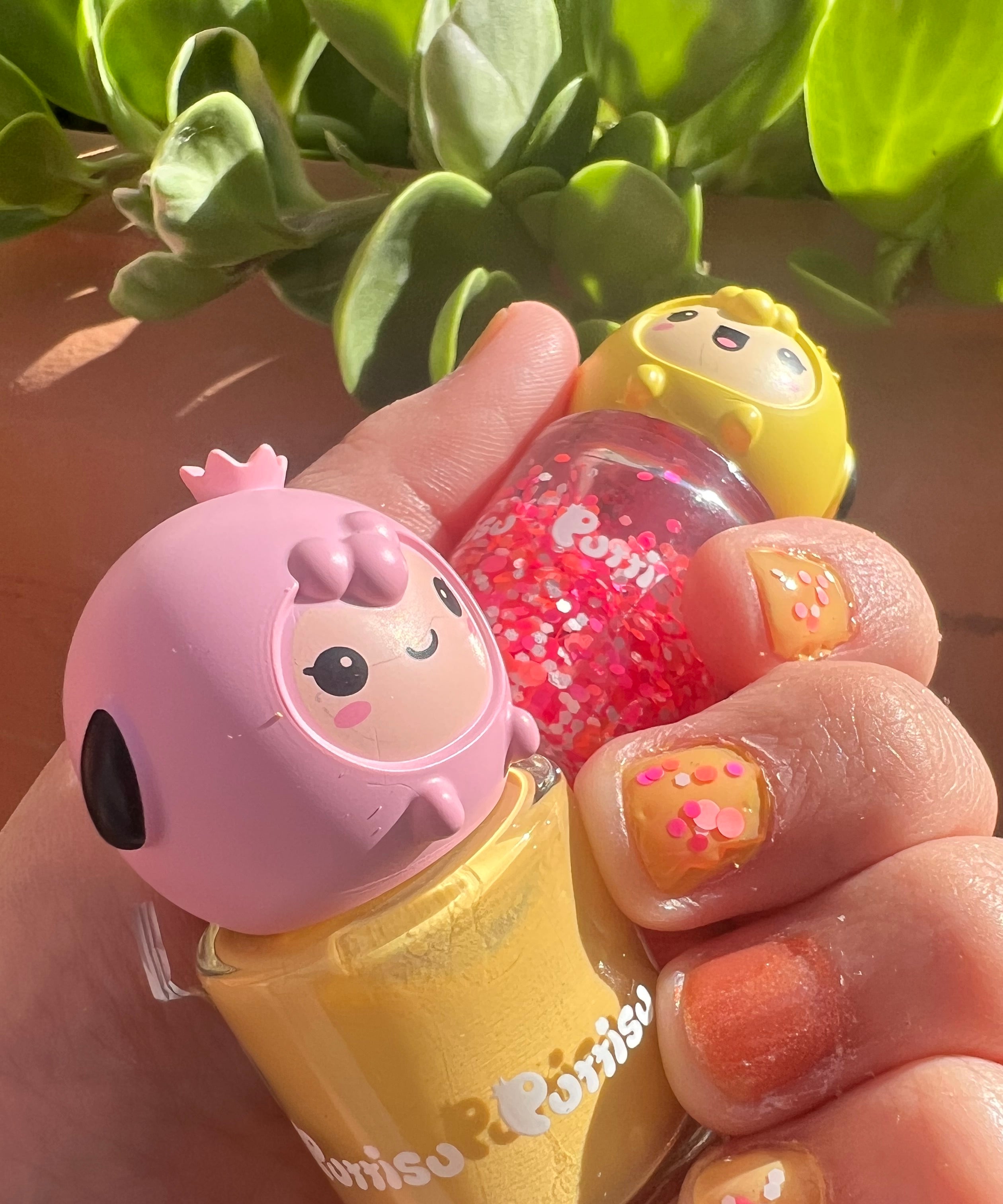 Customer photo of Puttisu 3-Color Nail Art Kit, peel-off kids nail polish set in cute character bottles with bright colors.
