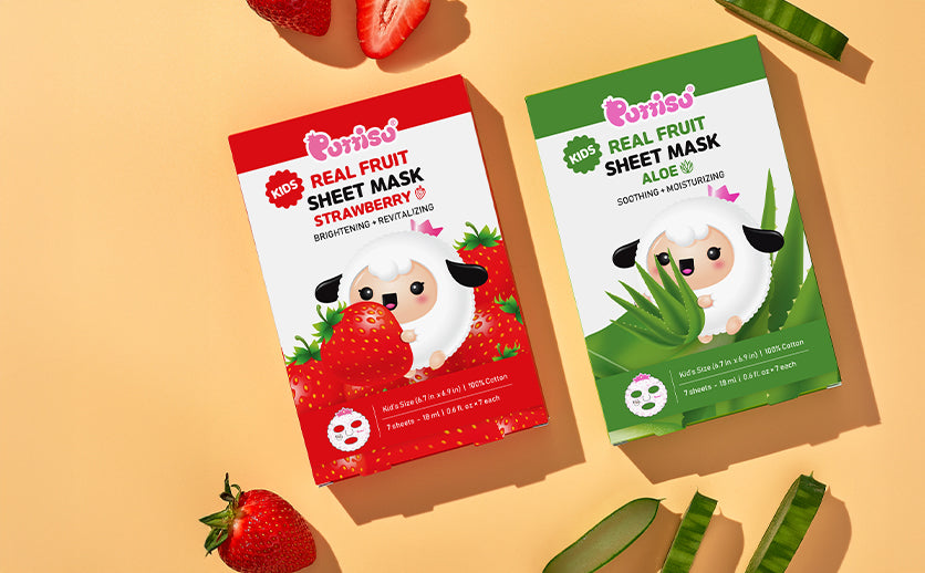 Two boxes of Puttisu children's sheet masks in red and green with strawberries and aloe vera.