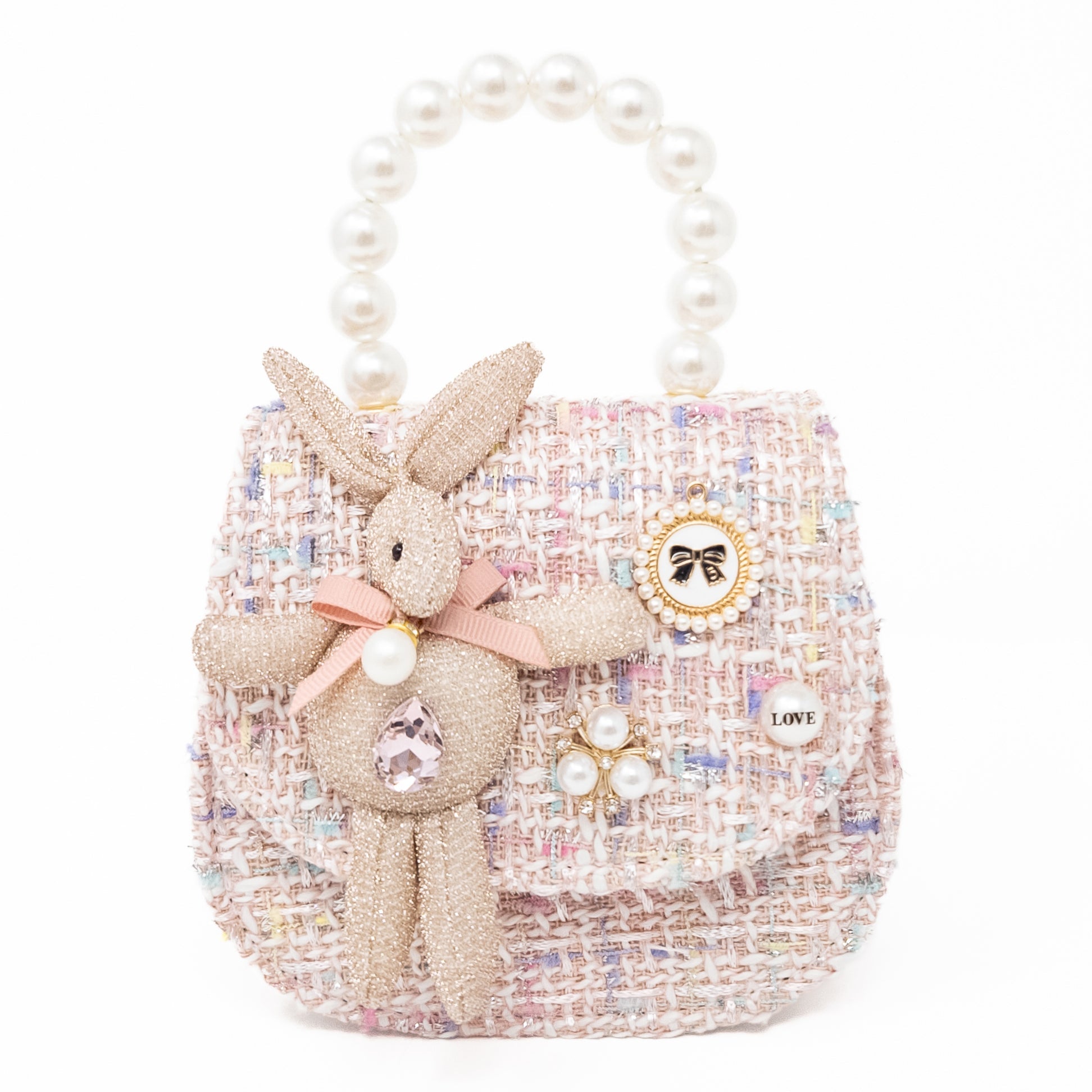 Pink tweed purse with a pearl handle and bunny embellishment.