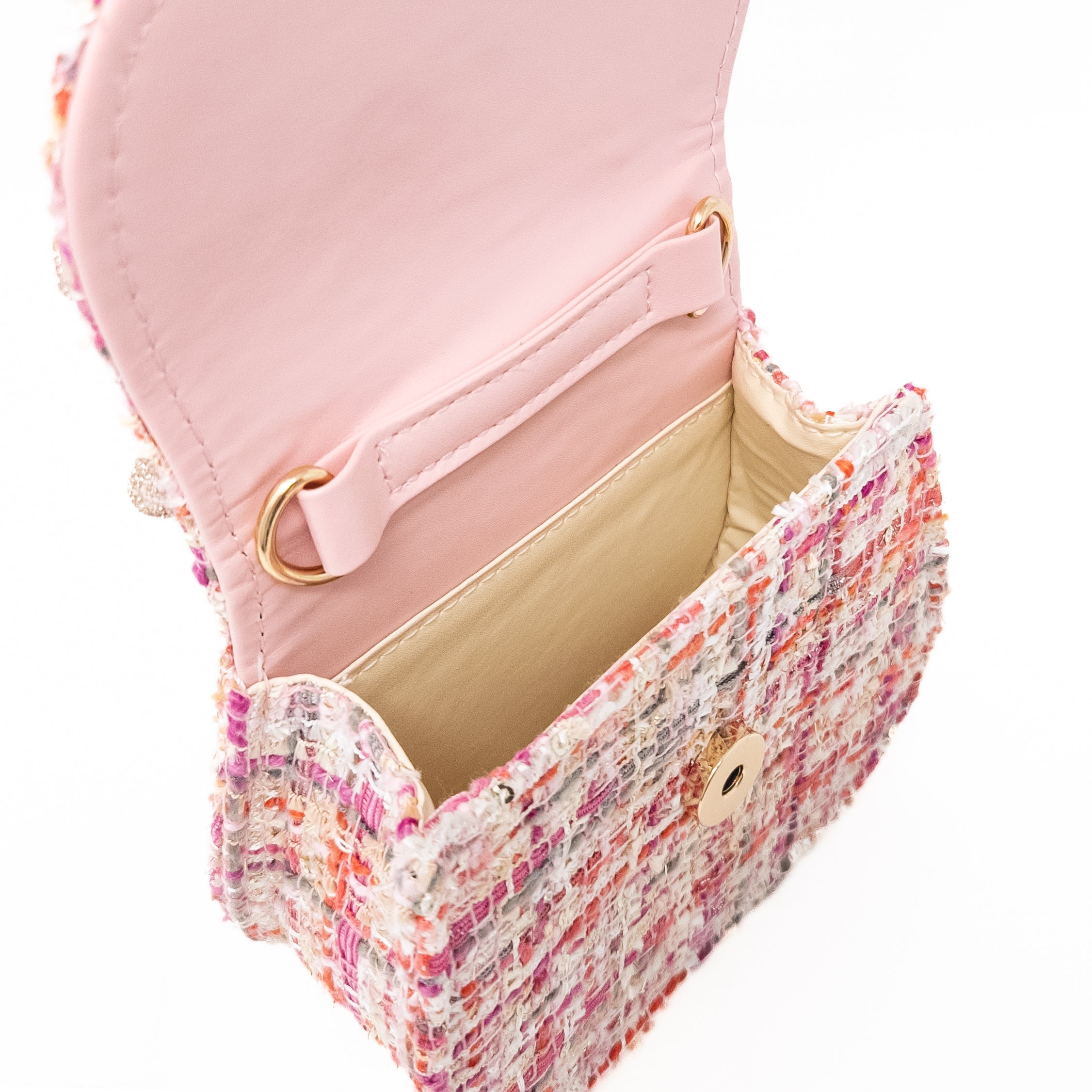 Open pink tweed purse with gold hardware.