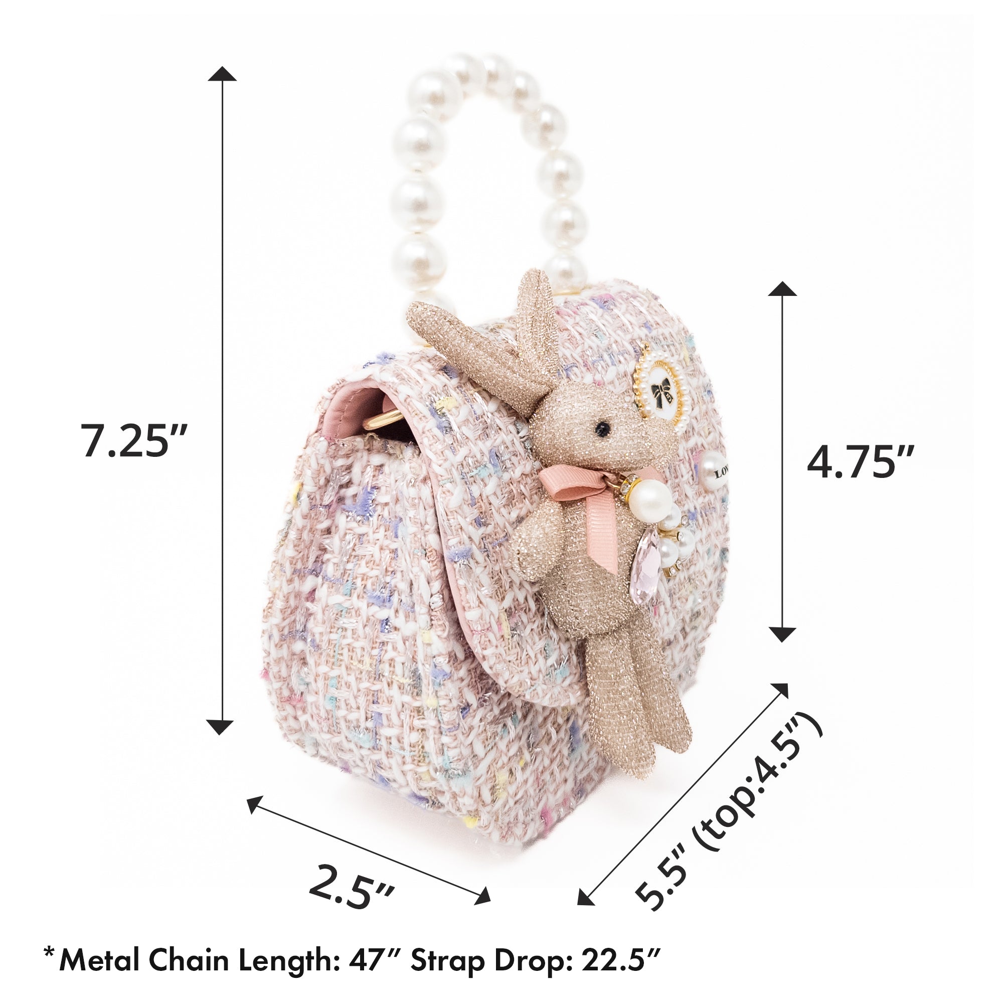 A pink tweed purse with a pearl handle and a bunny decoration.