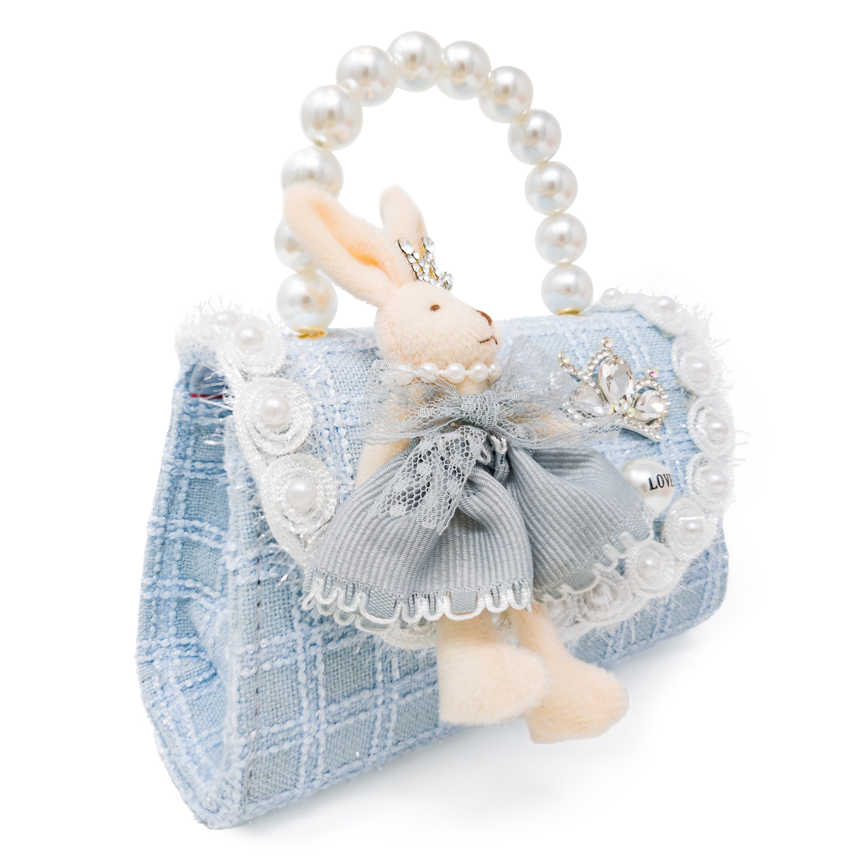 Puttisu Bunny Bloom - powder blue. Decorative handbag with a rabbit figure, pearl handle, and decorative elements on a white background