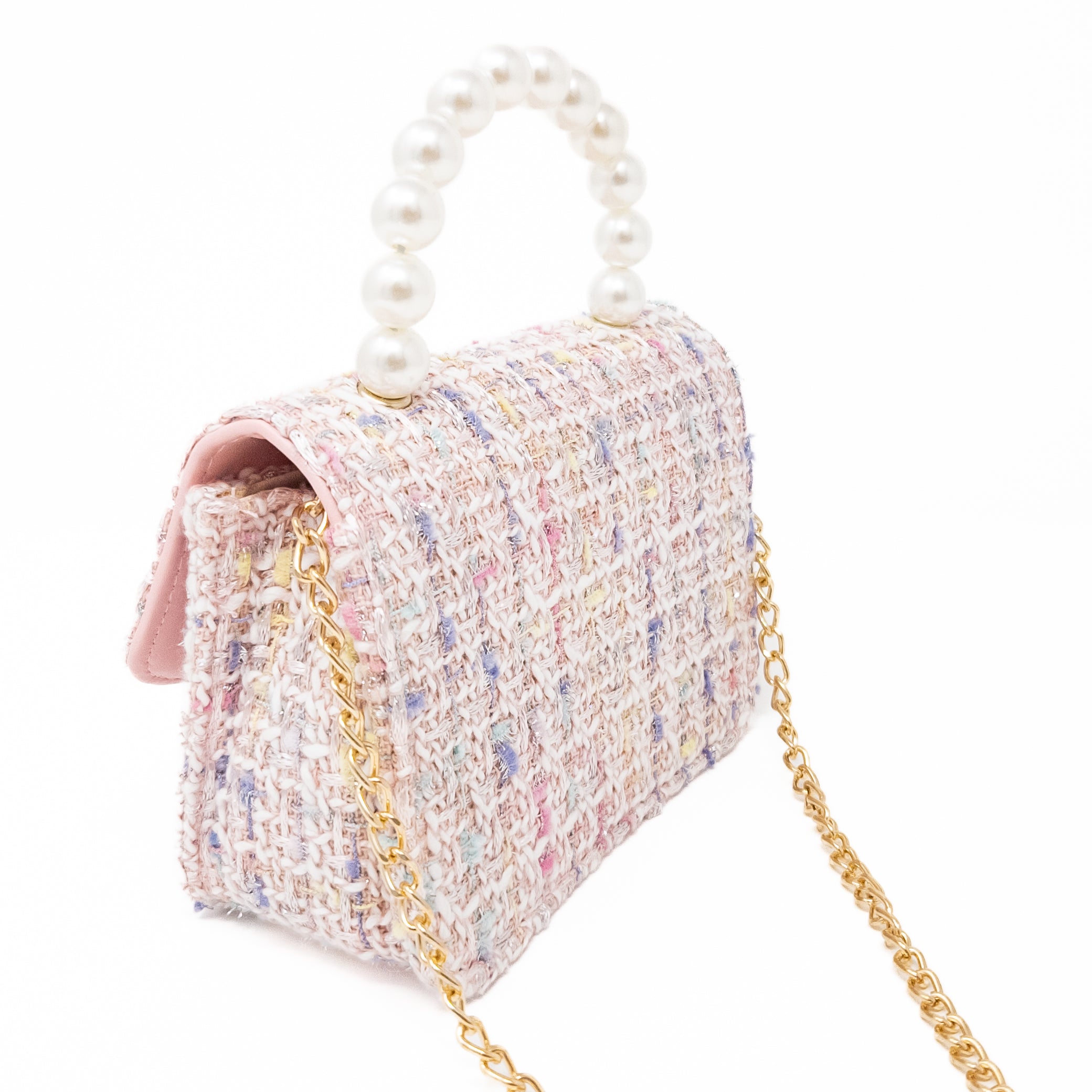 Tweed handbag with pearl handle and gold chain strap.