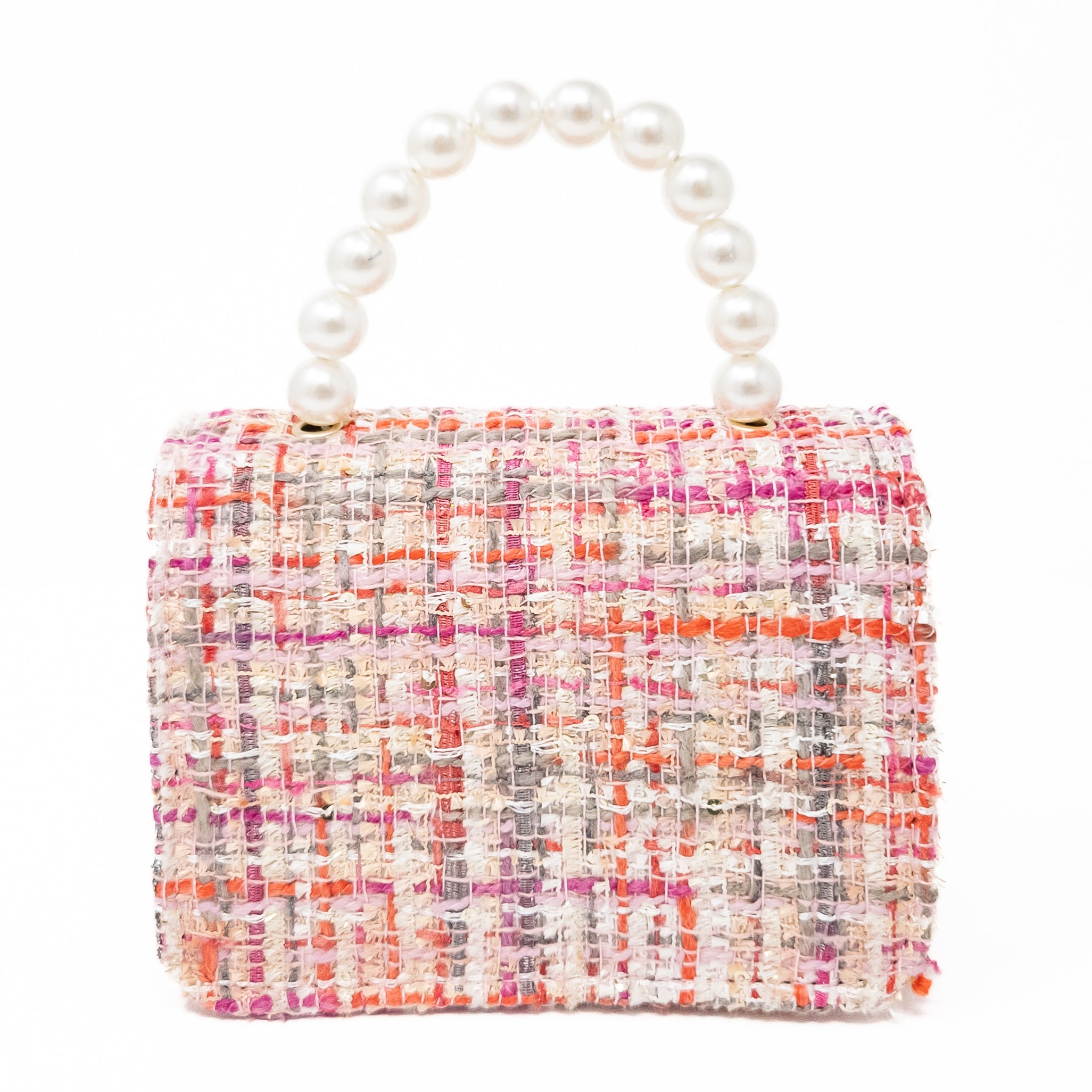 Pink tweed handbag with pearl handle.