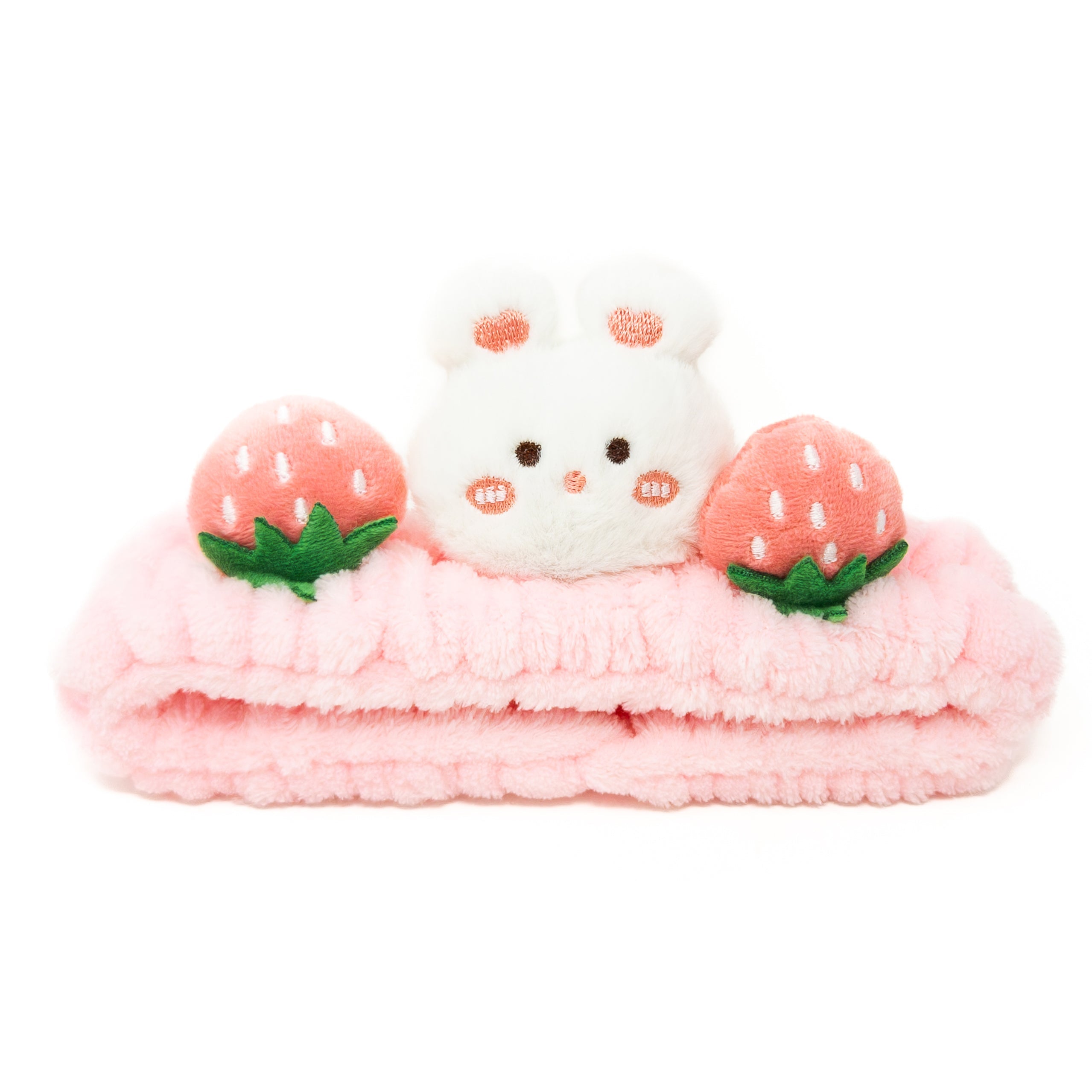 Pink plush headband with bunny and strawberries.