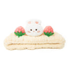 Plush headband with rabbit and strawberry details.