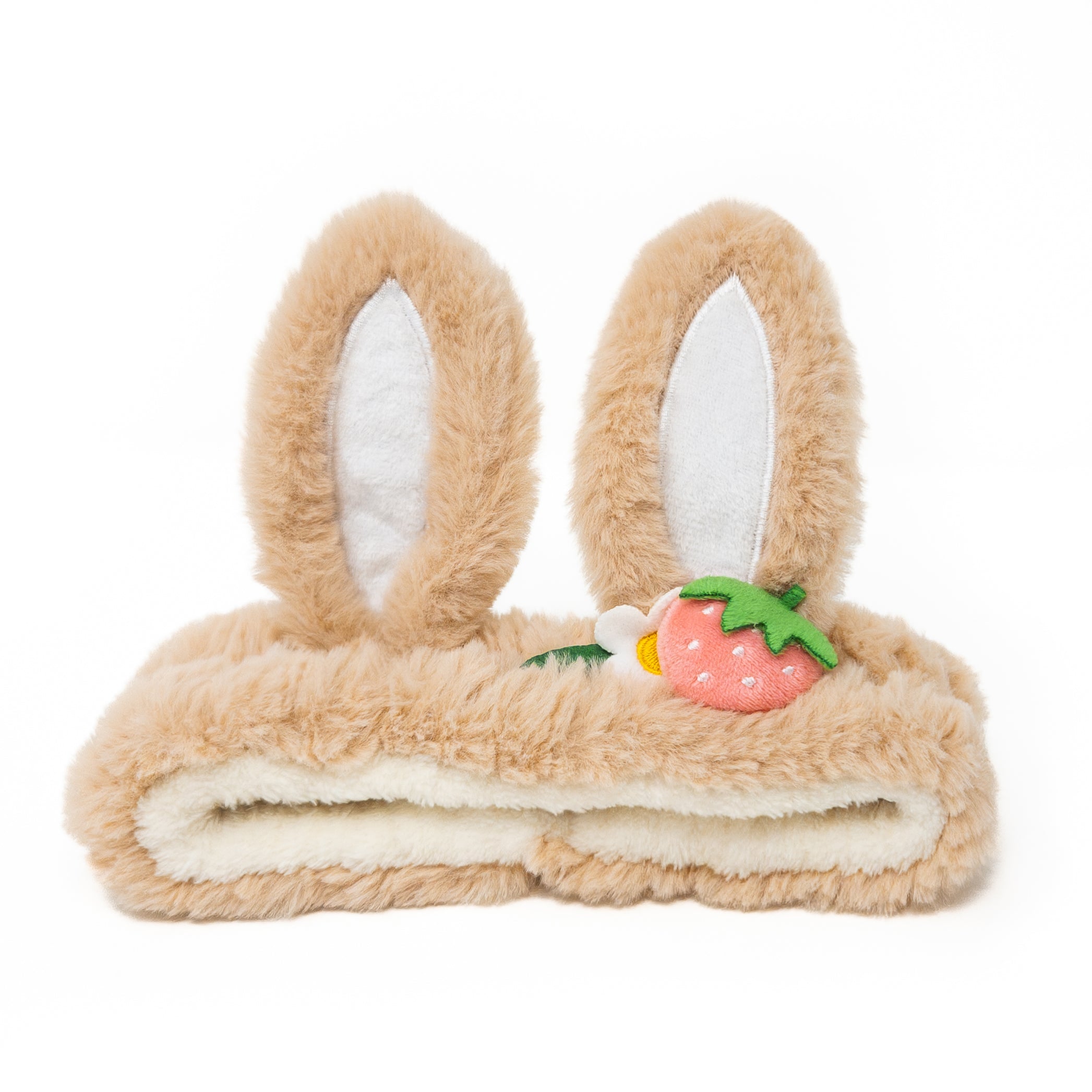 Tan plush bunny ear headband with strawberry accent.