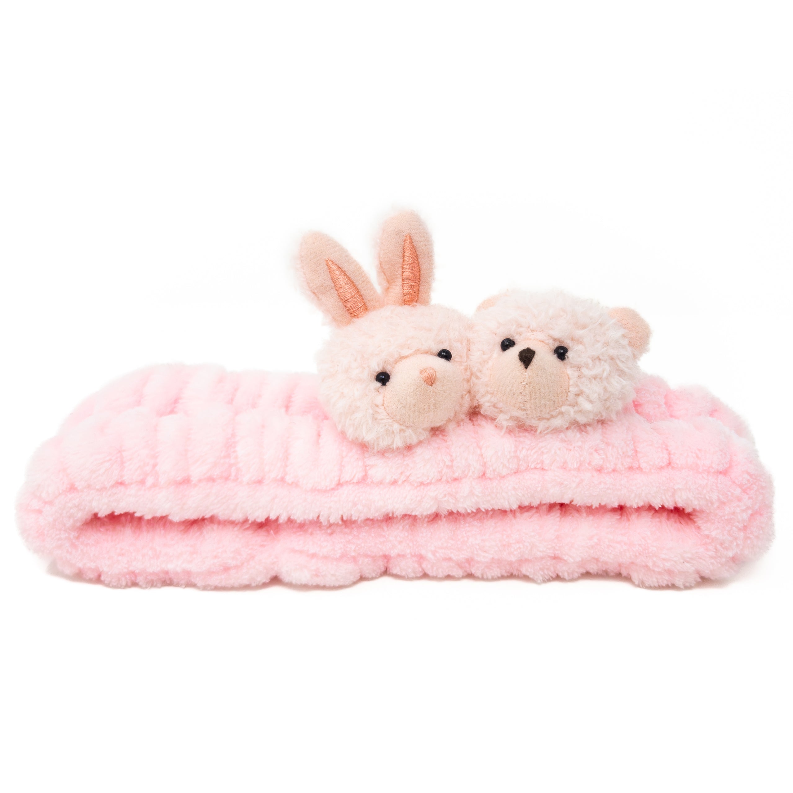Pink plush headband with bunny and teddy bear appliqués.