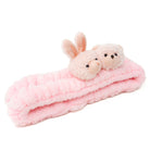 Pink, plush headband with bunny and bear faces.