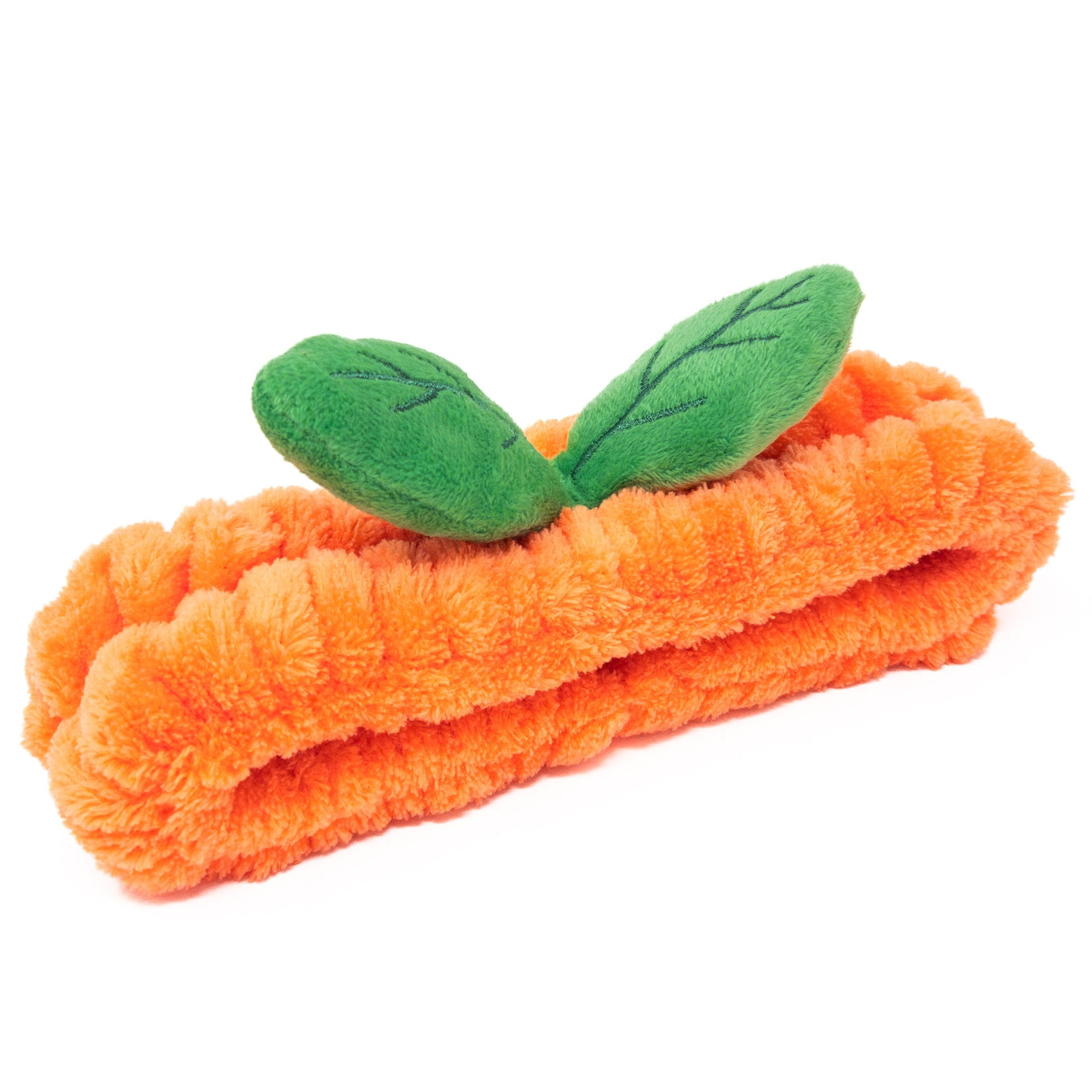 Orange terry cloth headband with green leaves.