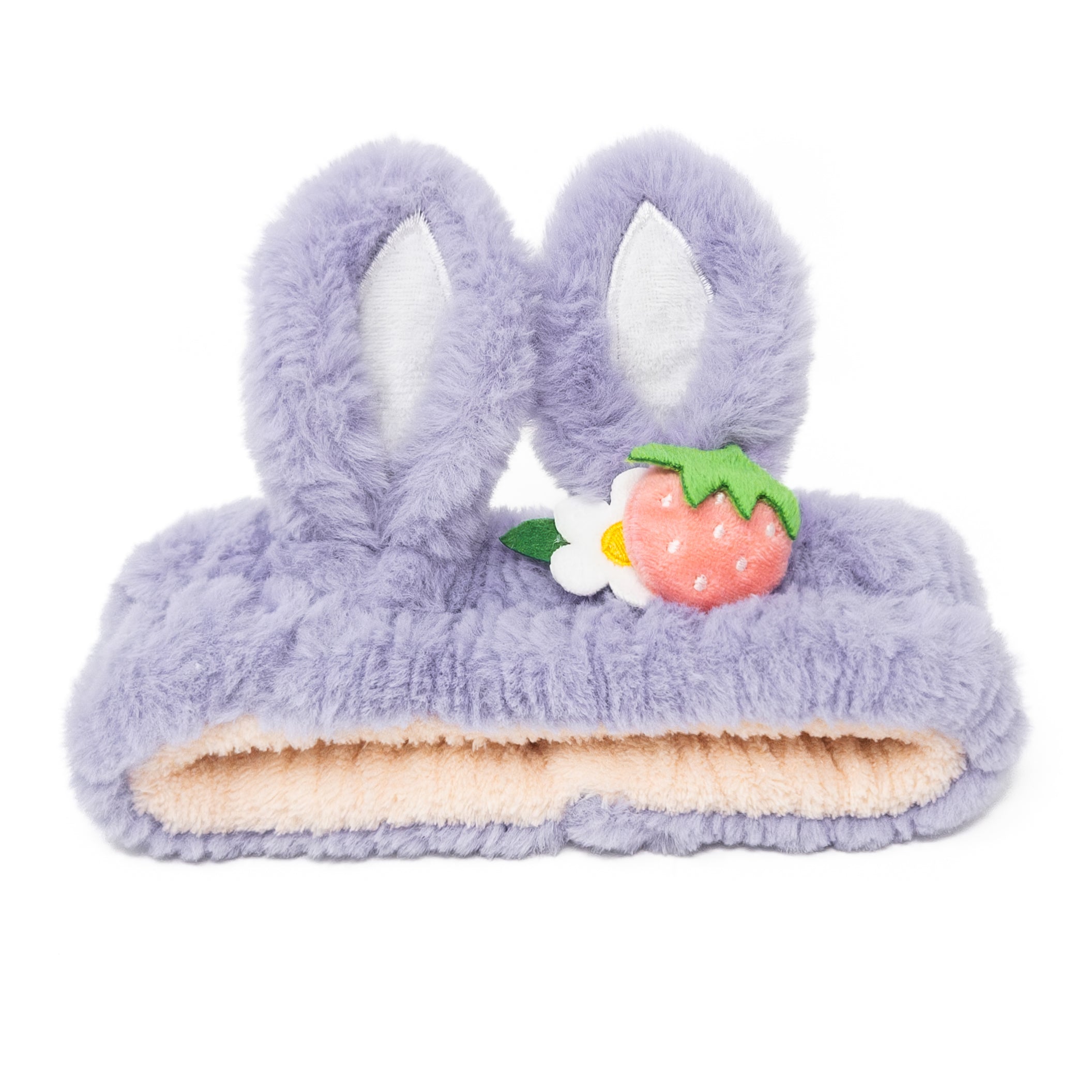 Purple furry headband with bunny ears and strawberry.