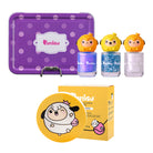 Cosmetics set with purple tin, nail polish bottles with animal tops, and a yellow compact case and box with a sheep cartoon.