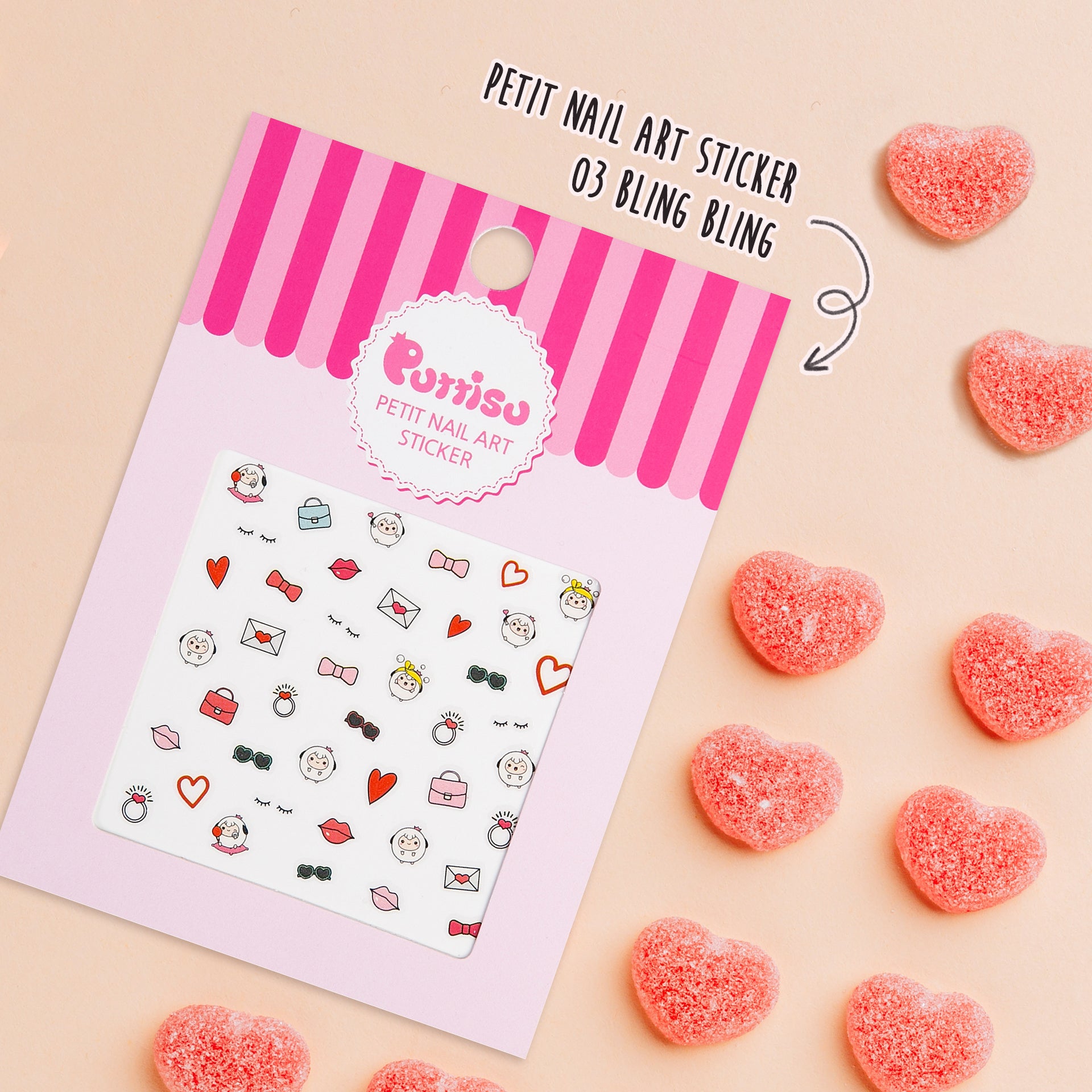 Close-up of a pack of "Purriso Petit Nail Art Sticker 03 Bling Bling" with heart-shaped candies.