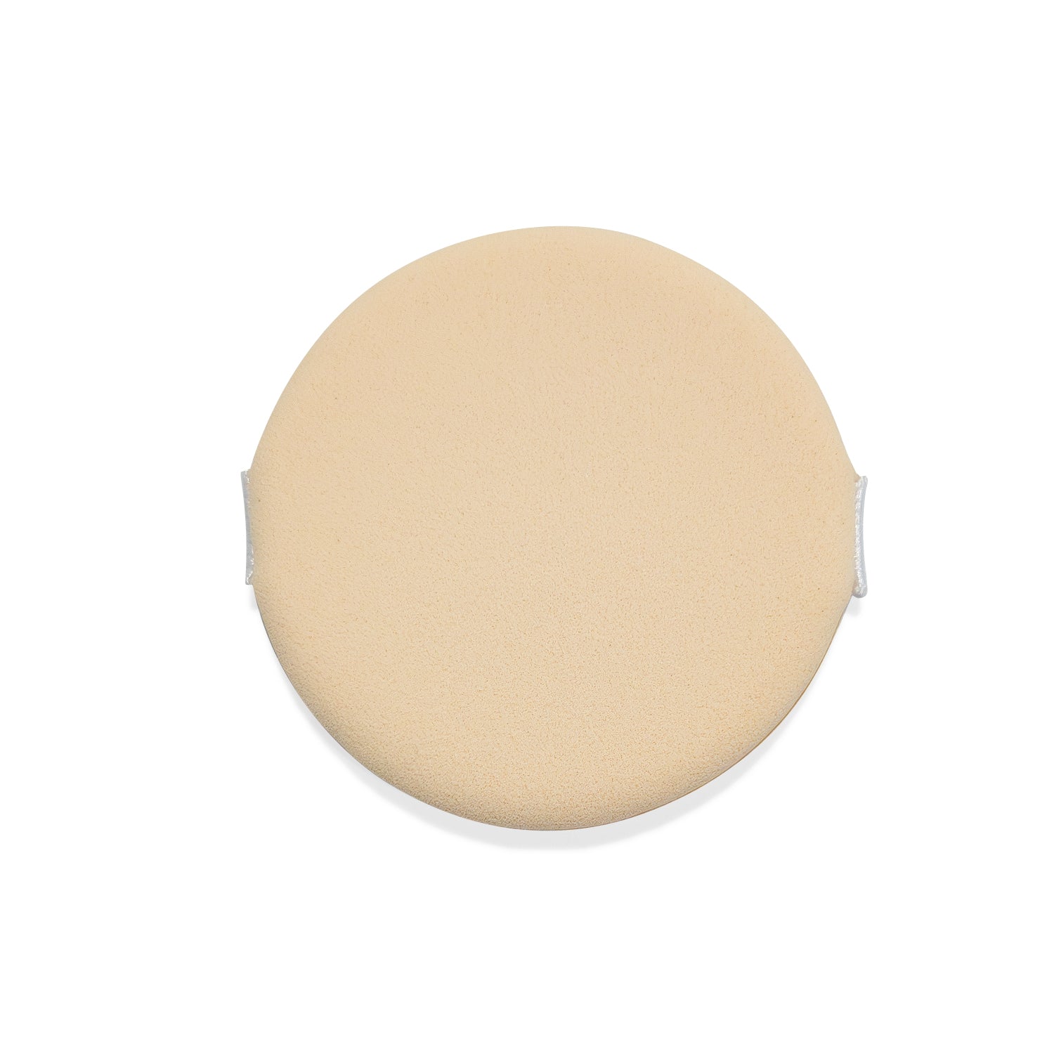 Beige makeup sponge.