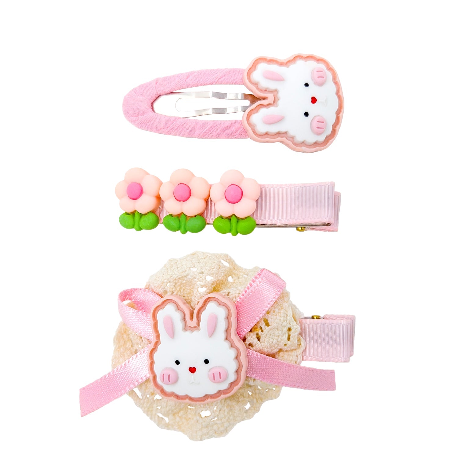 Three hair clips with pink and white accents.