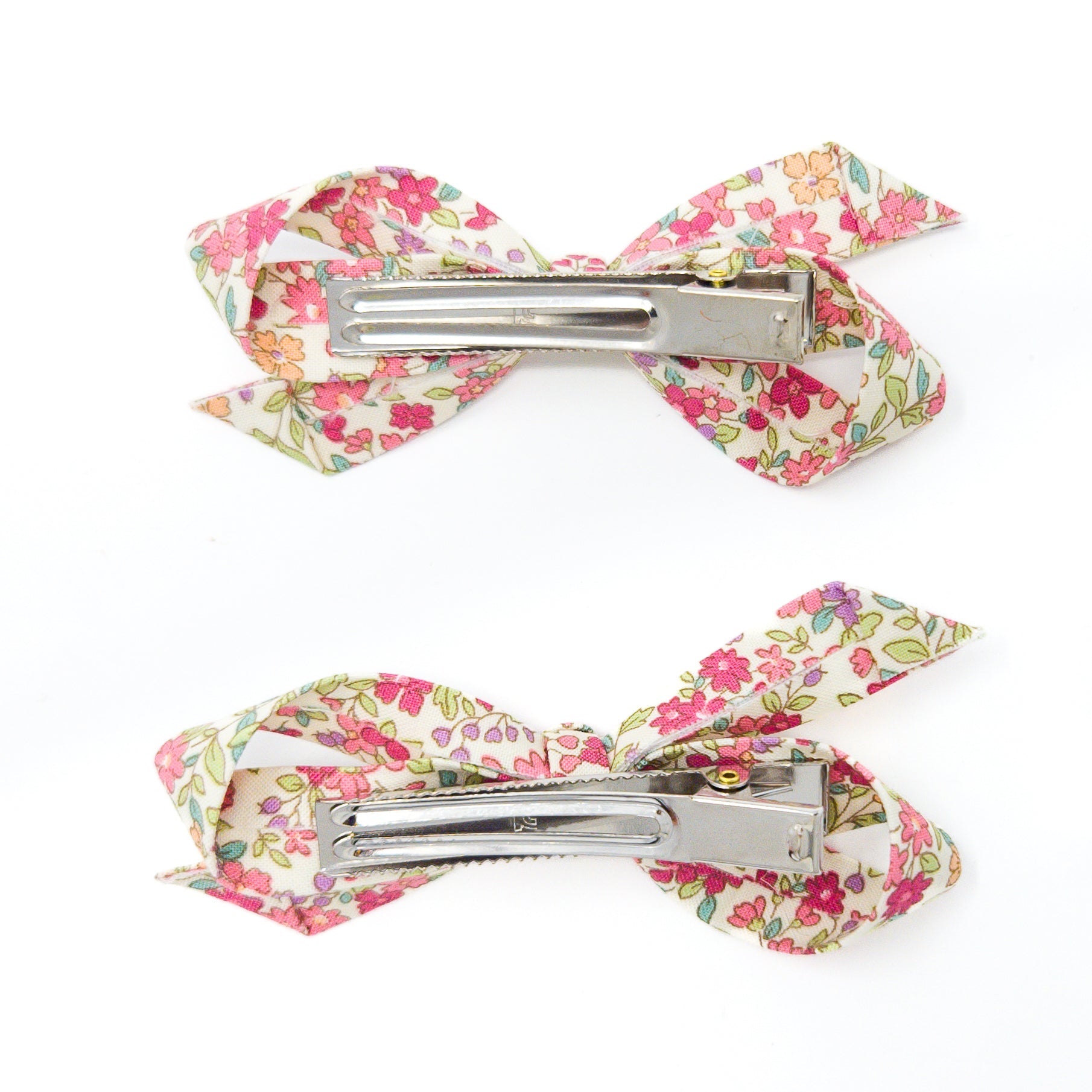 Two floral hair clips.