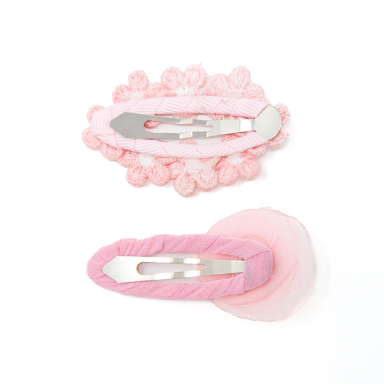 Two pink flower hair clips.
