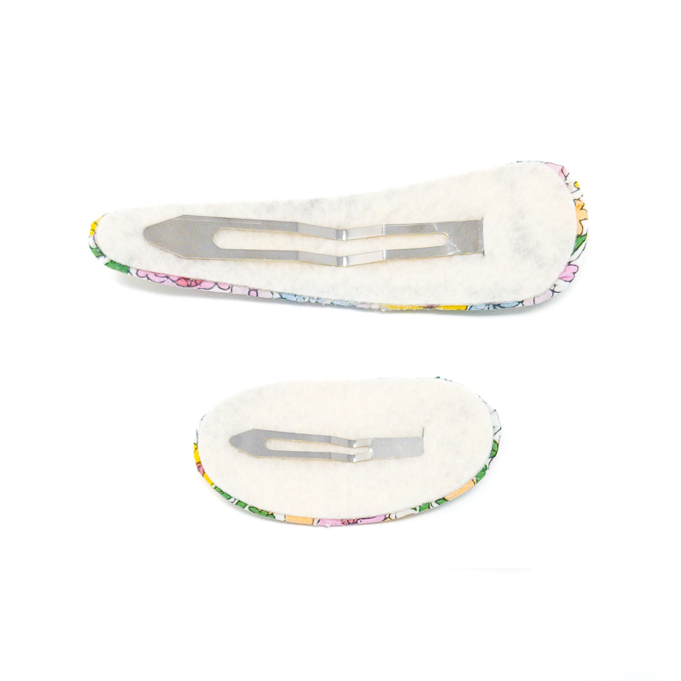 Two floral hair clips on a white background.