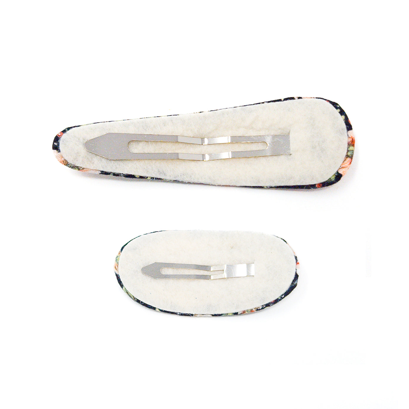 Two floral hair clips, felt backing.