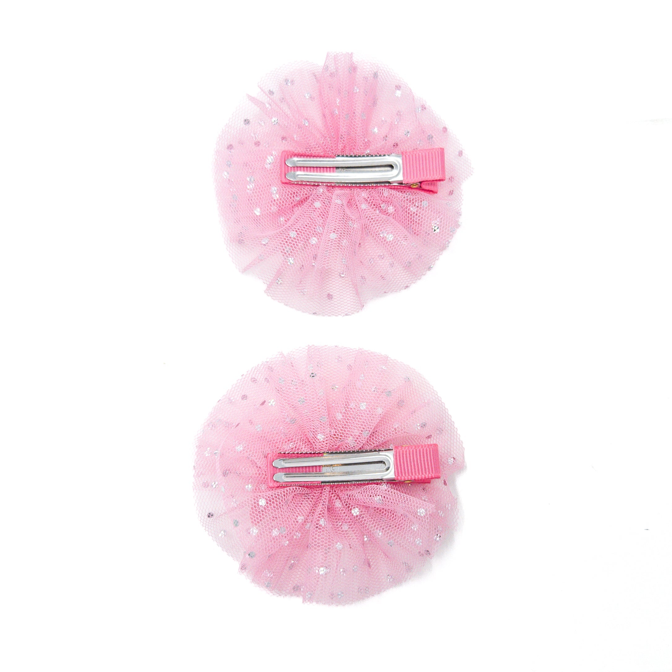 Two pink tulle hair clips with silver sparkles.