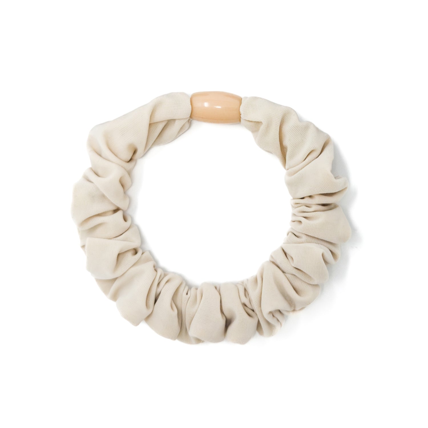 Beige scrunchie with a wooden bead.