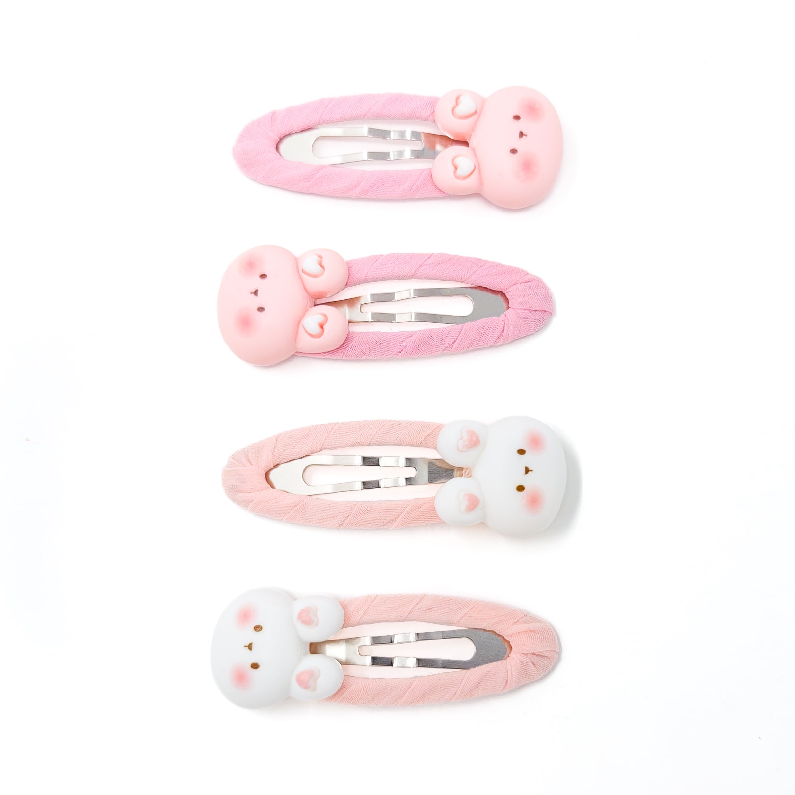 Four hair clips with rabbit-shaped decorations.