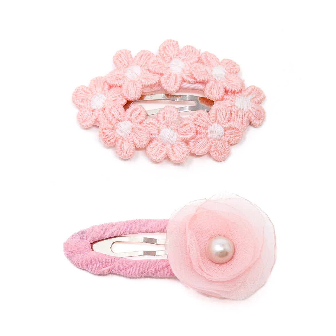 Two pink flower hair clips.