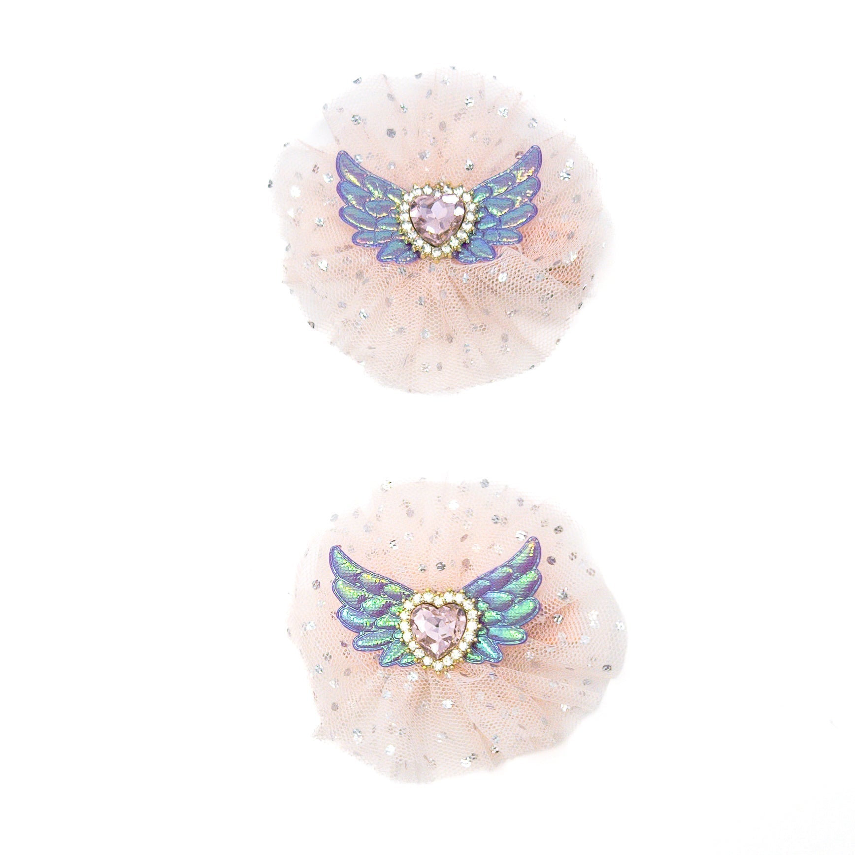 Two pink tulle hair accessories with heart and wing embellishments.