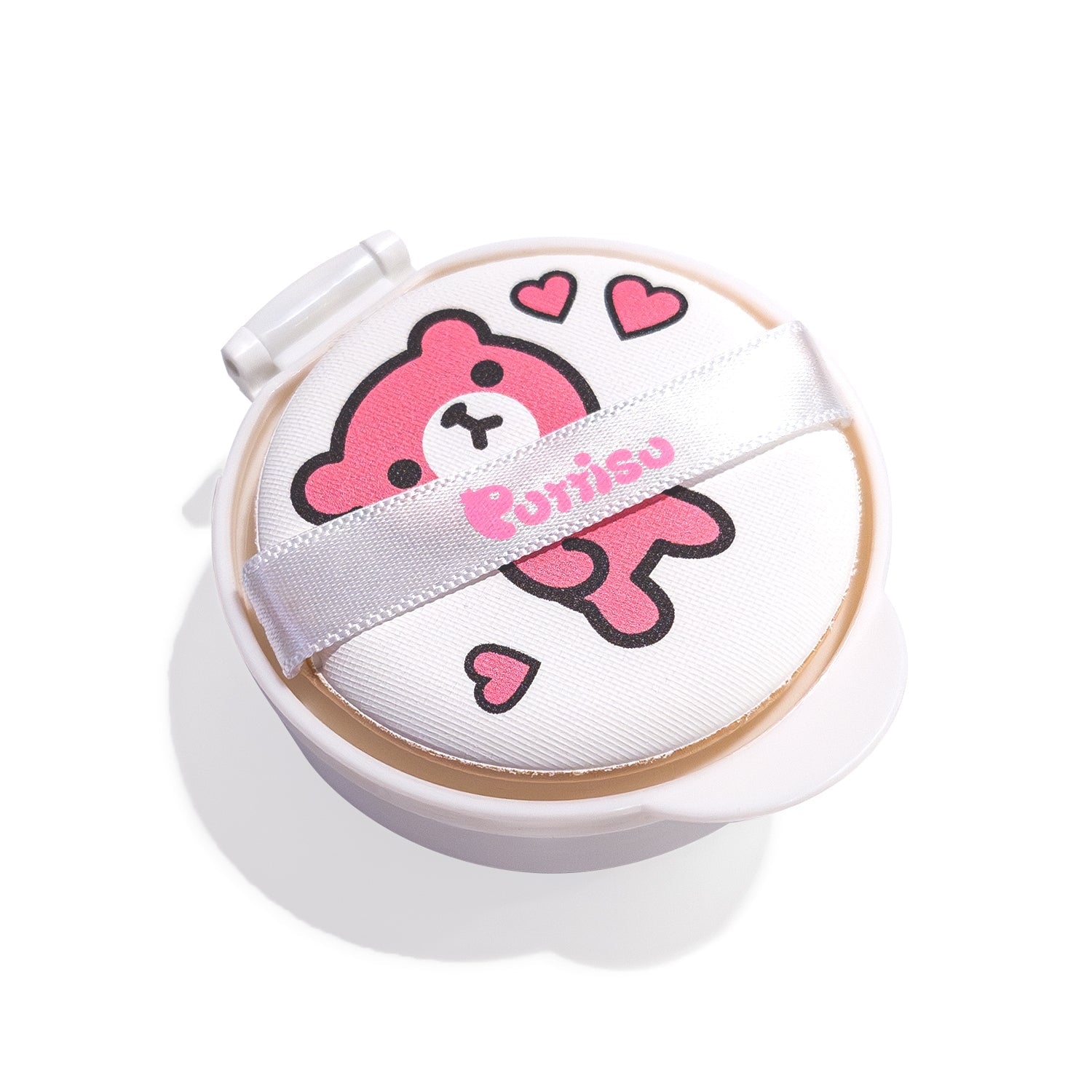 White cushion compact with pink bear design and white ribbon.