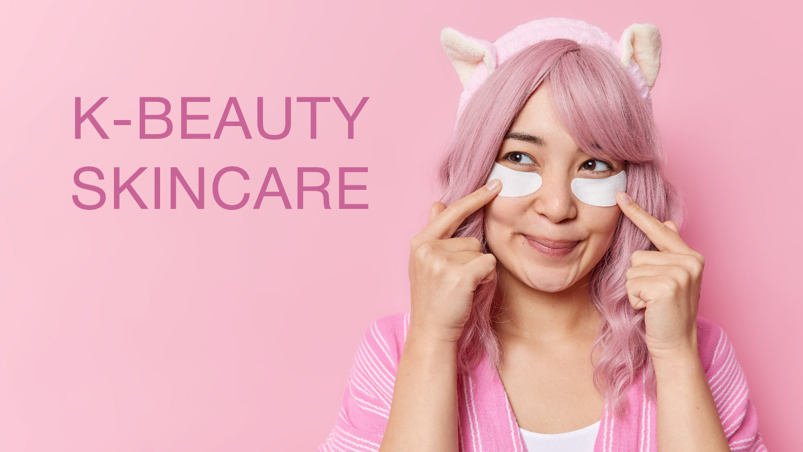 K-Beauty skincare concept with woman applying under-eye patches wearing pink headband and hair against pastel background.