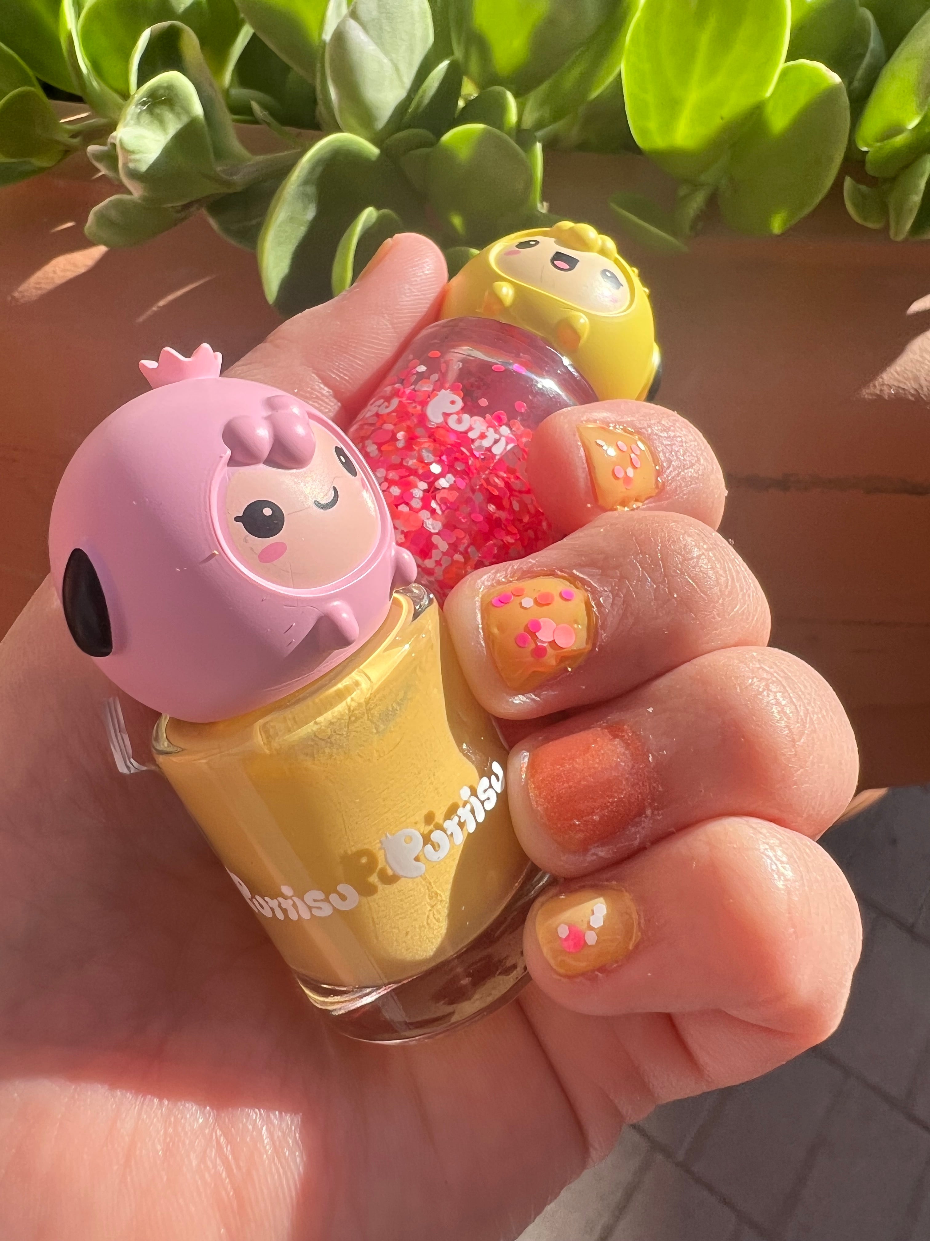 Customer photo of Puttisu 3-Color Nail Art Kit, peel-off kids nail polish set in cute character bottles with bright colors.