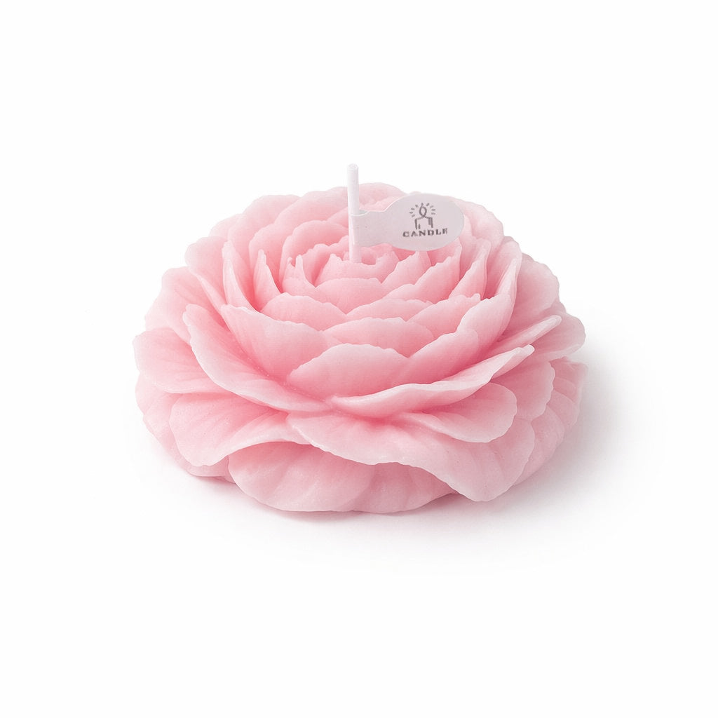 Pink peony flower soy wax candle by Jellycup, featuring a small white flag label.