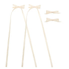 Ivory ribbon bow clip set featuring two long trailing bows and two shorter bow clips.