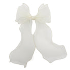 Ivory organza large bow clip with long, flowing sheer tails and visible wire-edged trim.