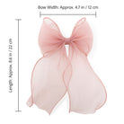Large pink organza bow clip with sheer, flowing tails and visible measurement details.