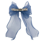 Blue sheer organza large bow hair clip with ruffled edges, viewed from the back revealing a silver-toned clip mechanism.