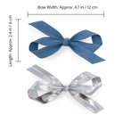 Bow Clip Set featuring one light denim blue bow and one shiny silver metallic bow.