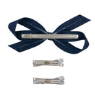 3-piece bow clip set with a large light denim striped bow clip and two smaller silver clips.