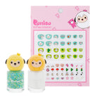 Petit nail sticker set with two small bottles of nail polish and a pink packaging sheet featuring cartoon characters.