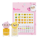 Two small bottles of nail polish with cartoon characters and a sheet of nail stickers on a pink background.