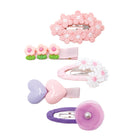 Set of 5 pastel tulle blossom charm hair clips, including pink crocheted flowers, heart shapes, and a pearl accent.